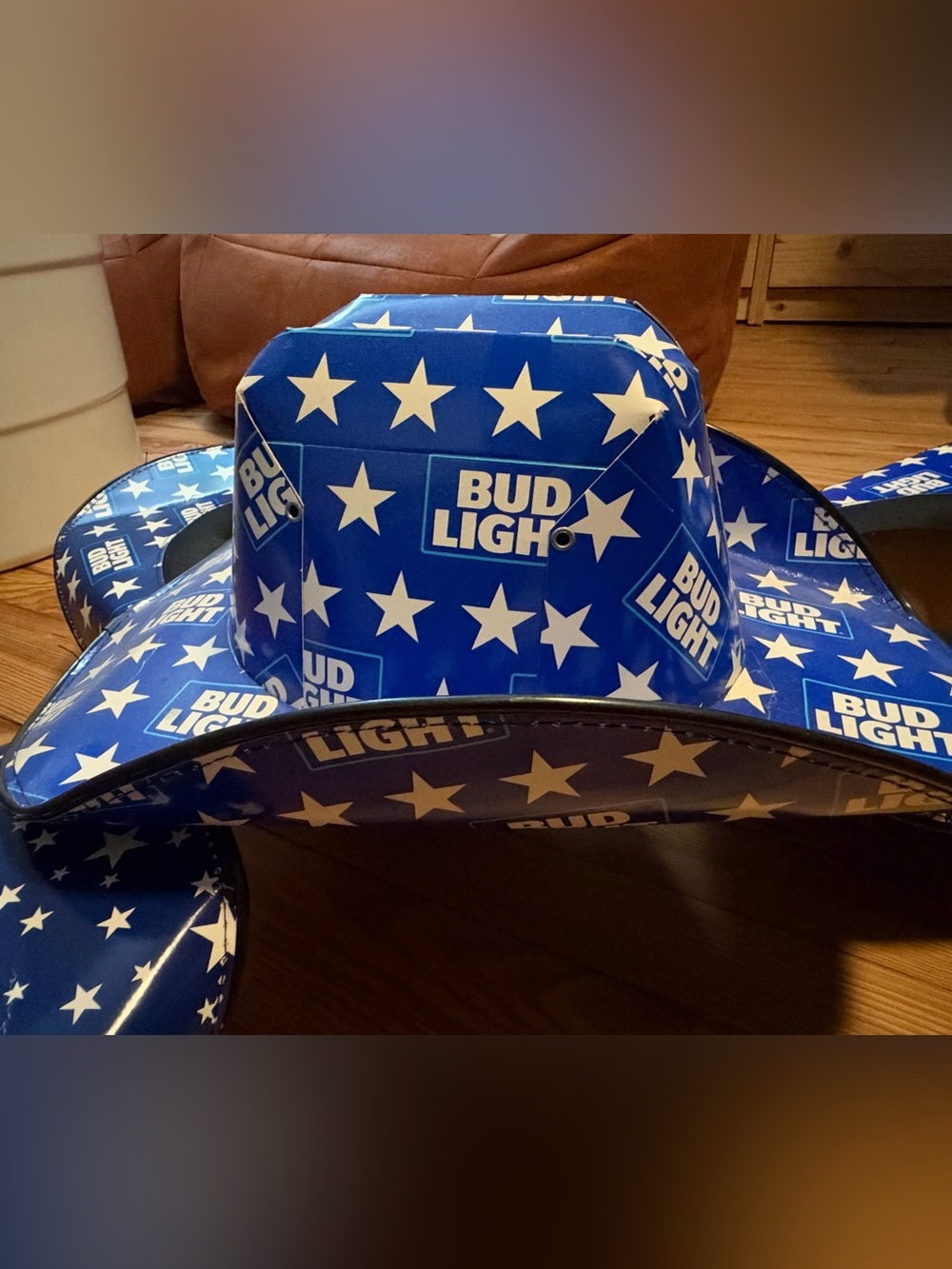 3 Bud light and 1 Budweiser Cowboy hats